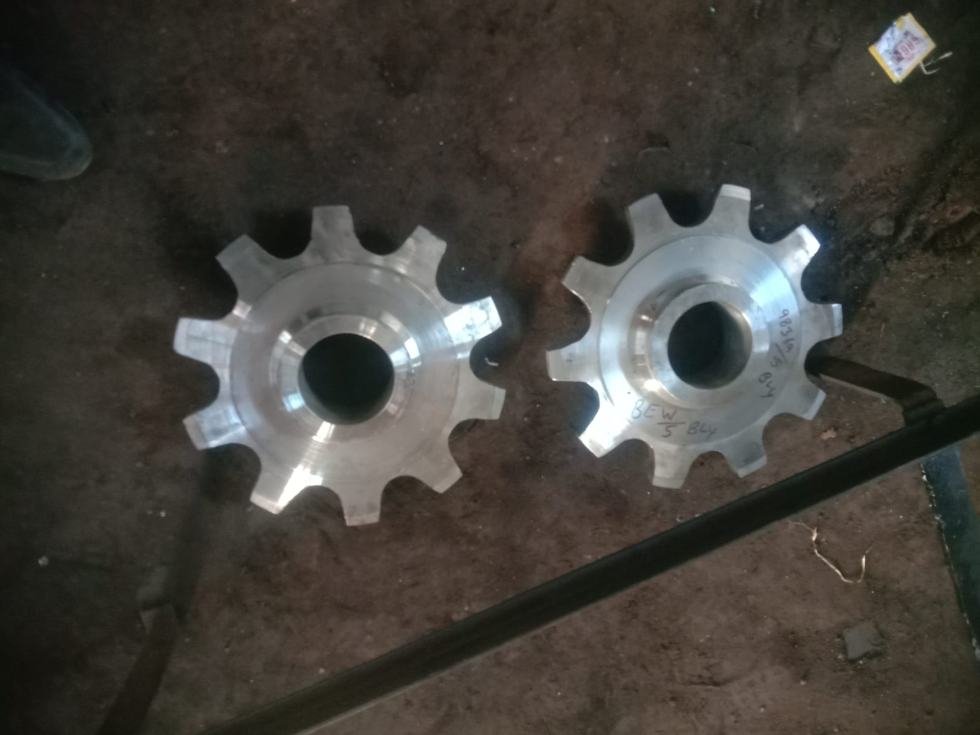 Freshly machined chain sprocket pair with finished tooth profile