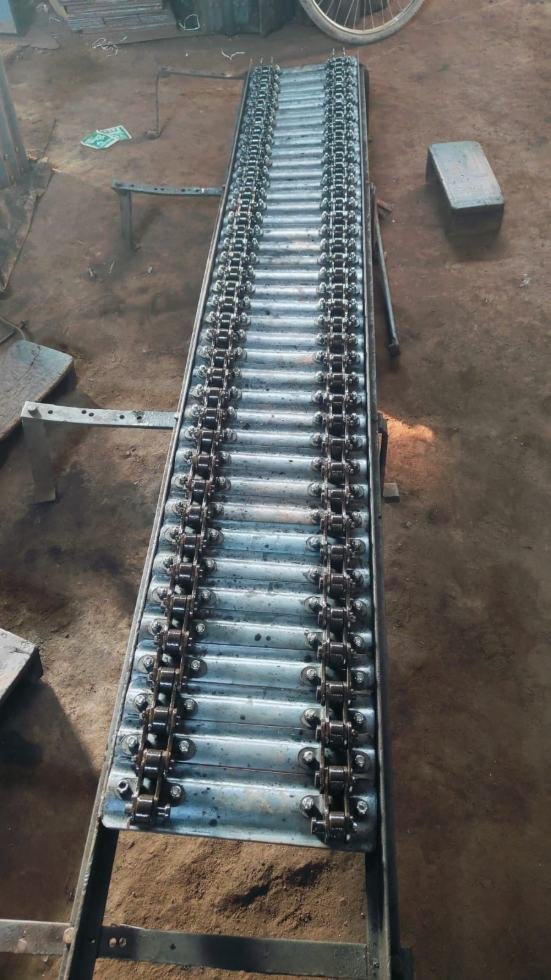 Full length slat conveyor built to customer drawing